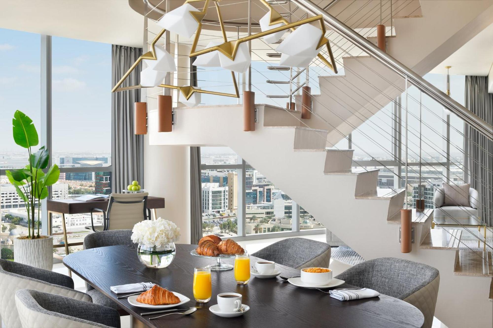 Intercontinental Residence Suites Dubai Festival City By Ihg Exteriör bild A breakfast table at the Waldorf Astoria Chengdu